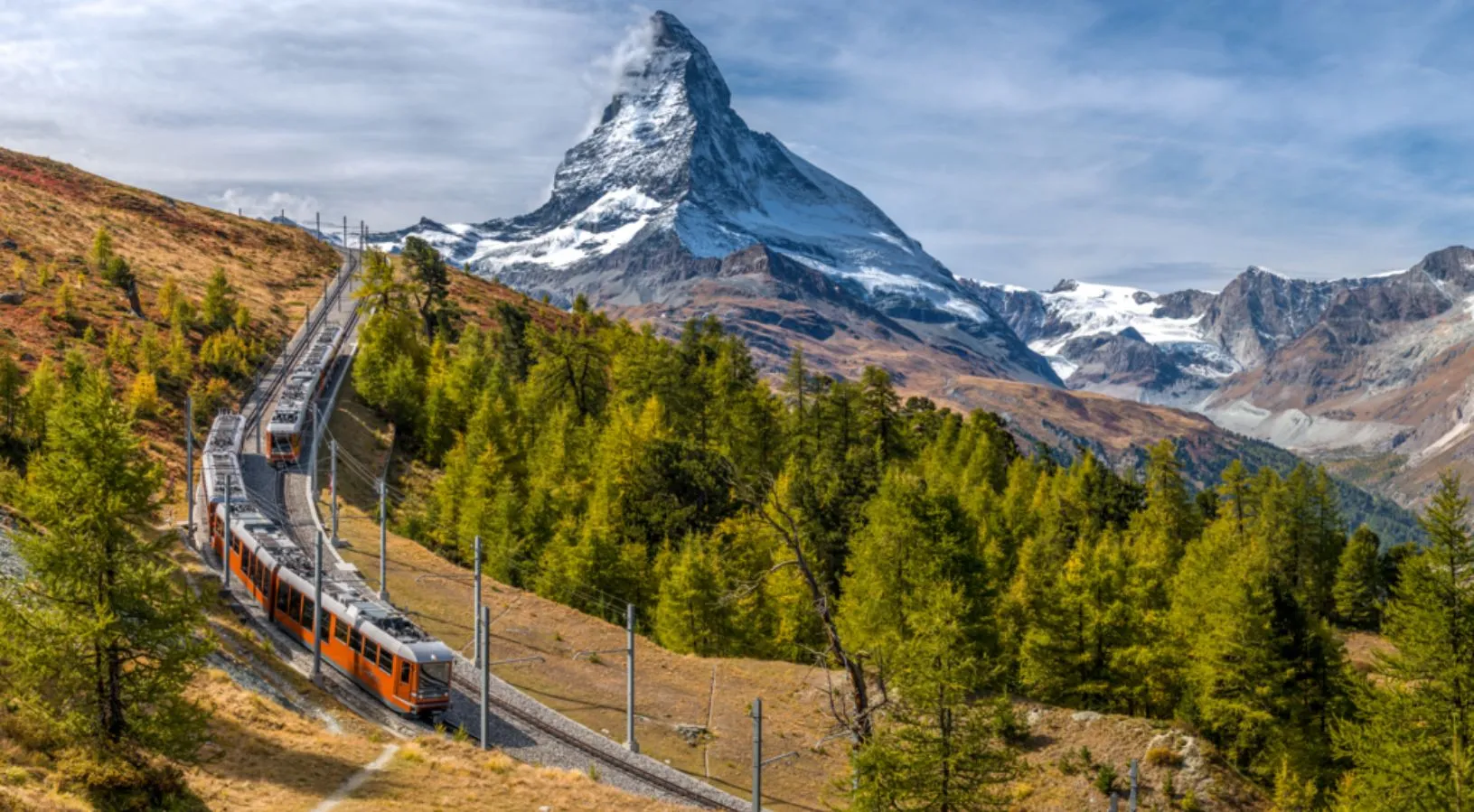 Two trains in a beautiful landscape of Gornergrat.
