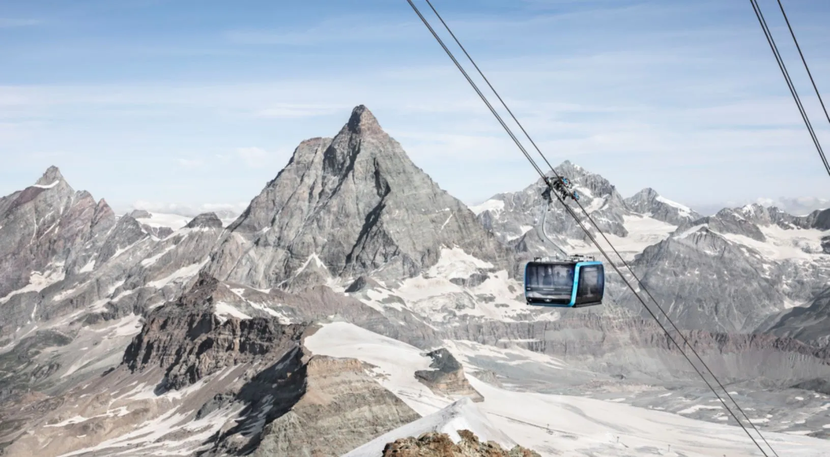 Matterhorn Glacier, one of the most beautiful mountains of Switzerland, acts as a backdrop for a Gondola.