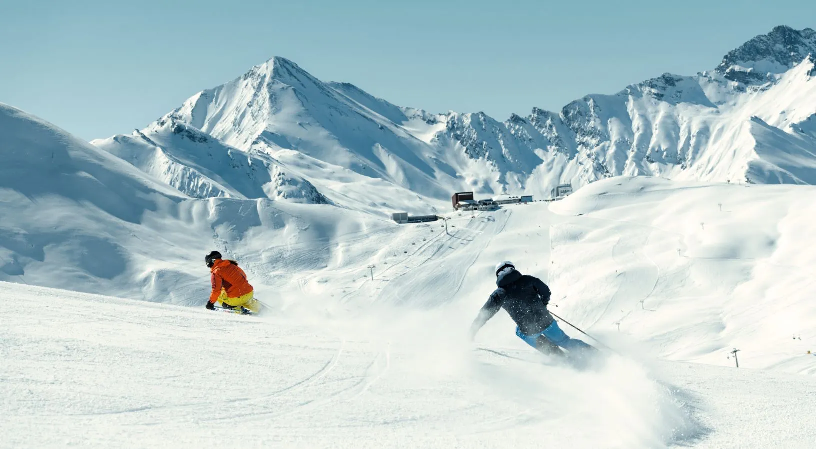 Skiing in the Swiss Alps during winter, highlighting mountain access with the Swiss Travel Pass 3, 4 or 8 days